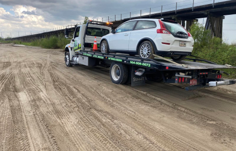 Local Light Heavy Duty Towing Tow Truck Wrecker Roadside Assistance Services Near Me in New Orleans Louisiana (LA) and surrounding areas including but not limited to the Westbank, Harvey, Gretna, Algiers, Marrero, Westwego, Belle Chasse, Chalmette, Luling, Destrehan, Kenner & Metairie.