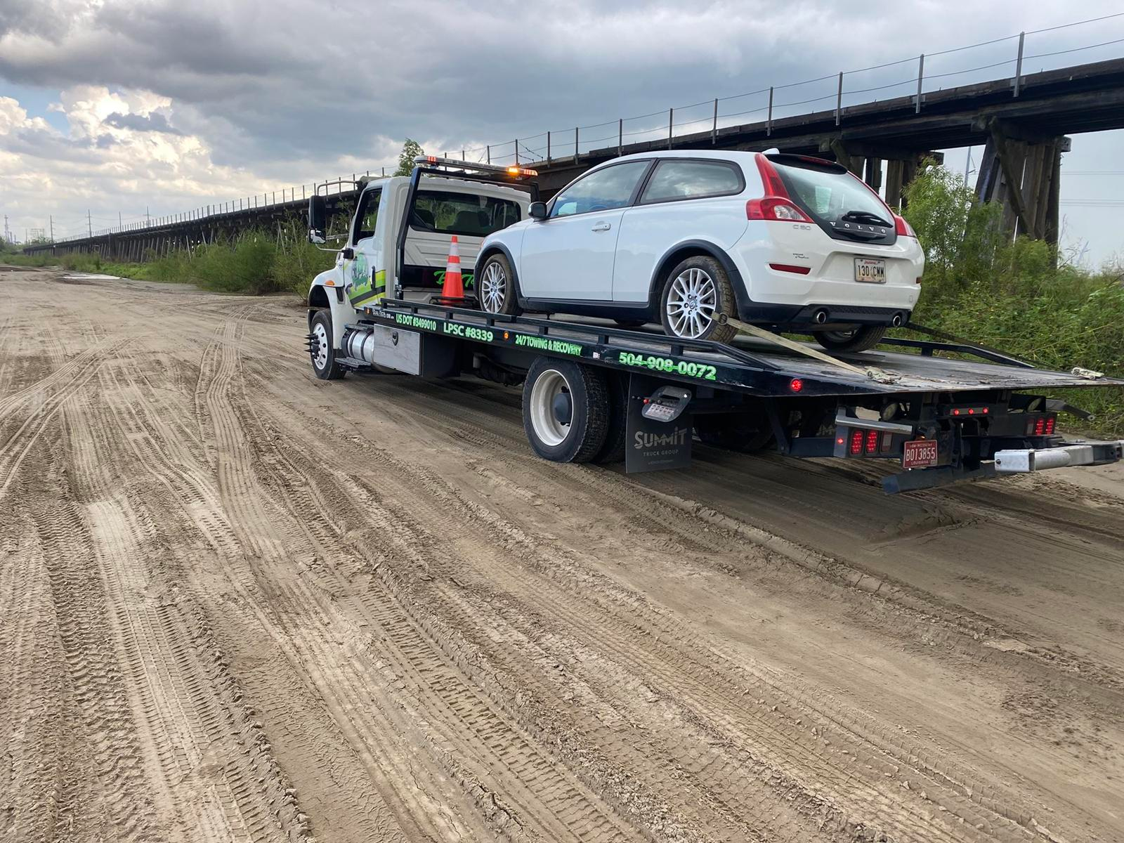 Local Light Heavy Duty Towing Tow Truck Wrecker Roadside Assistance Services Near Me in New Orleans Louisiana (LA) and surrounding areas including but not limited to the Westbank, Harvey, Gretna, Algiers, Marrero, Westwego, Belle Chasse, Chalmette, Luling, Destrehan, Kenner & Metairie.