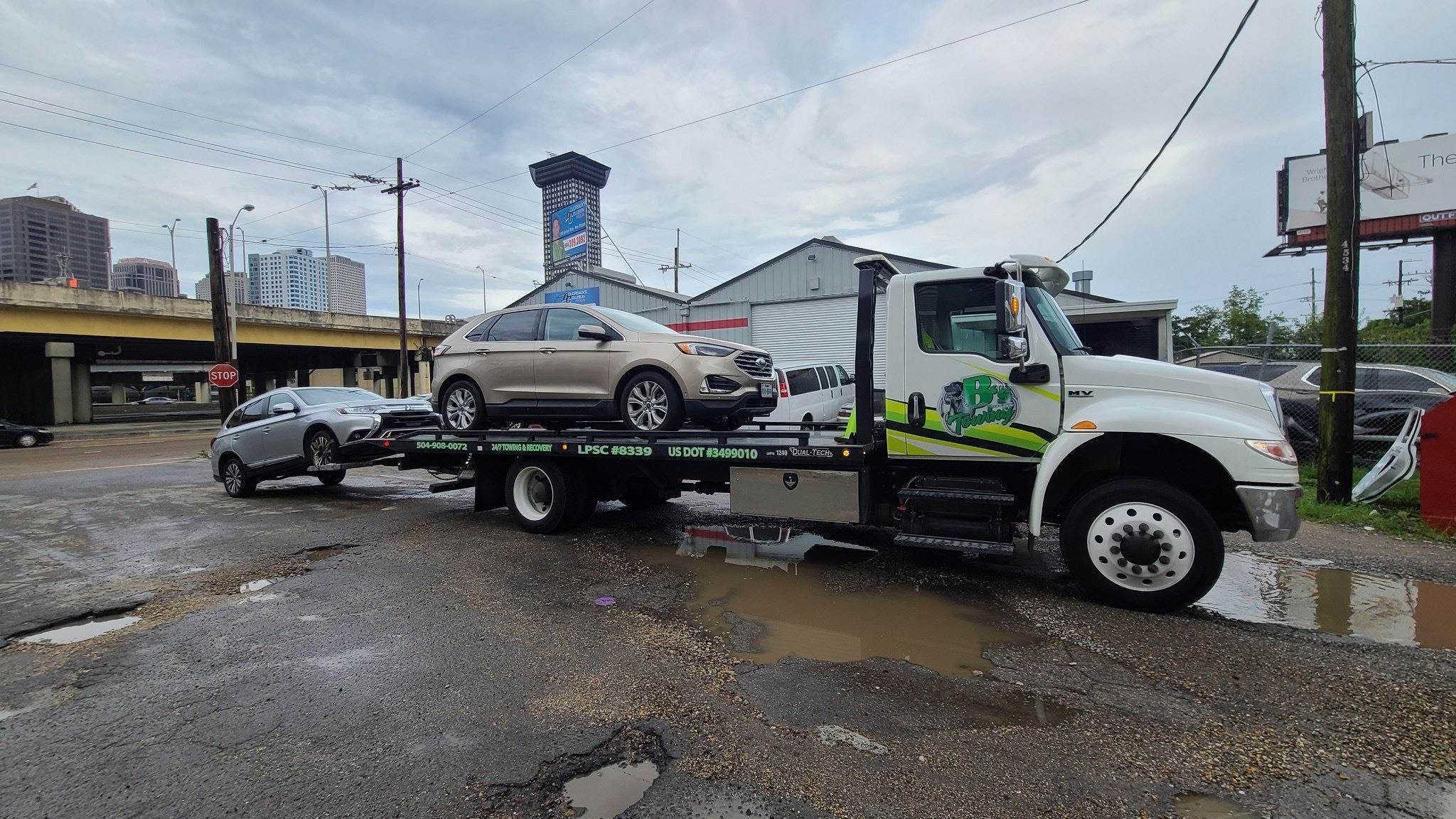 Local Light Heavy Duty Towing Tow Truck Wrecker Roadside Assistance Services Near Me in New Orleans Louisiana (LA) and surrounding areas including but not limited to the Westbank, Harvey, Gretna, Algiers, Marrero, Westwego, Belle Chasse, Chalmette, Luling, Destrehan, Kenner & Metairie.