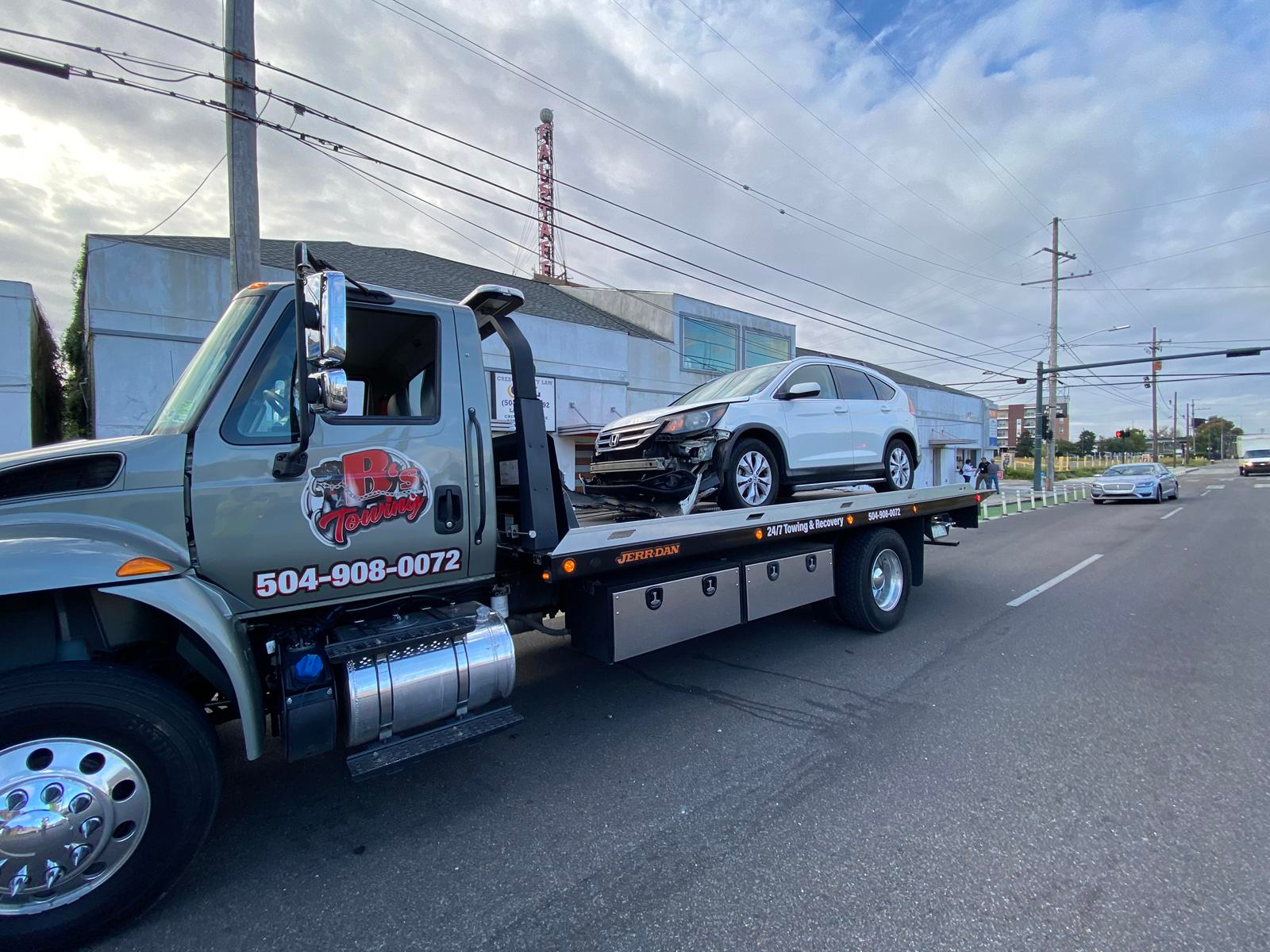 Local Light Heavy Duty Towing Tow Truck Wrecker Roadside Assistance Services Near Me in New Orleans Louisiana (LA) and surrounding areas including but not limited to the Westbank, Harvey, Gretna, Algiers, Marrero, Westwego, Belle Chasse, Chalmette, Luling, Destrehan, Kenner & Metairie.