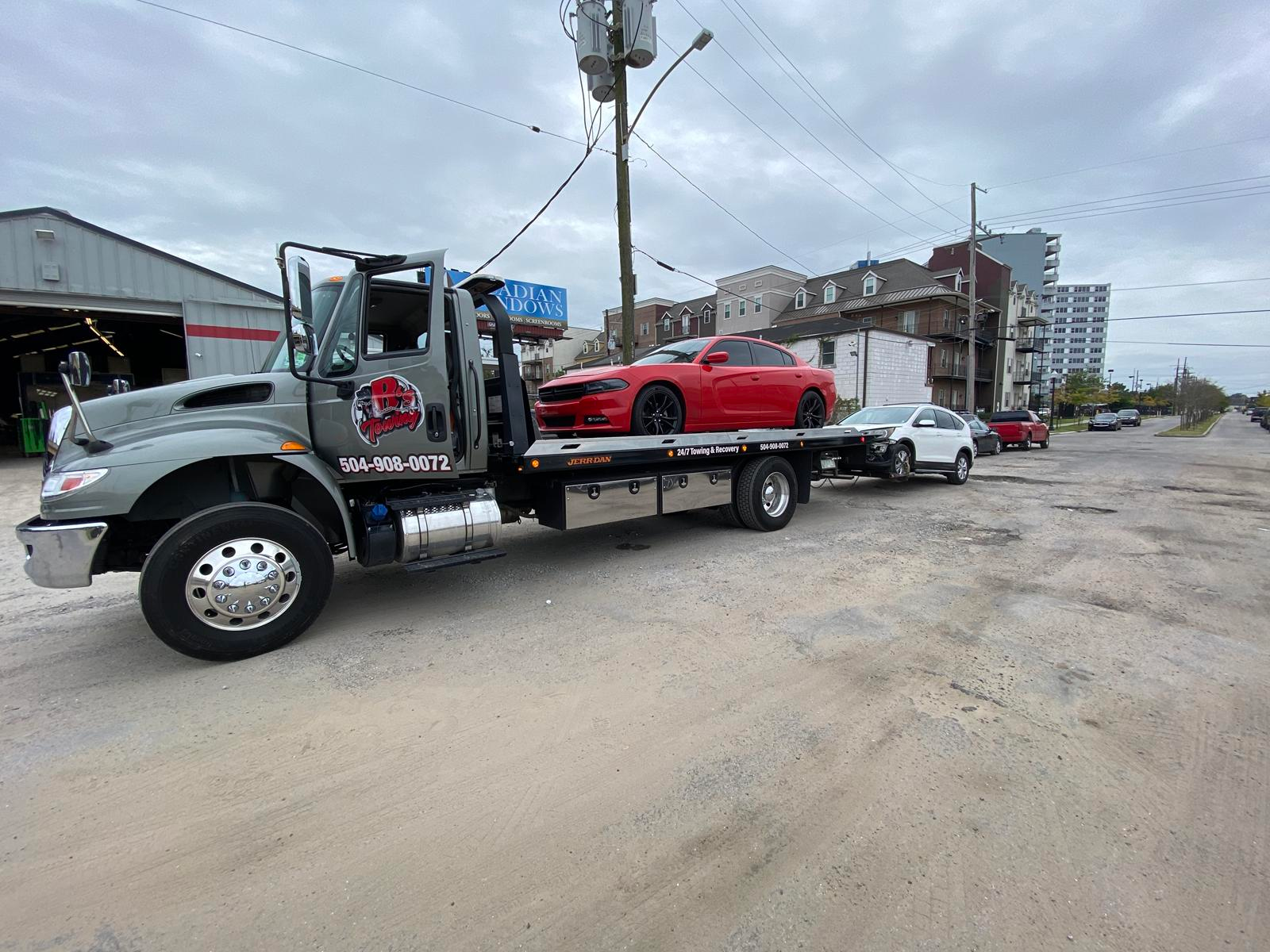 Local Light Heavy Duty Towing Tow Truck Wrecker Roadside Assistance Services Near Me in New Orleans Louisiana (LA) and surrounding areas including but not limited to the Westbank, Harvey, Gretna, Algiers, Marrero, Westwego, Belle Chasse, Chalmette, Luling, Destrehan, Kenner & Metairie.