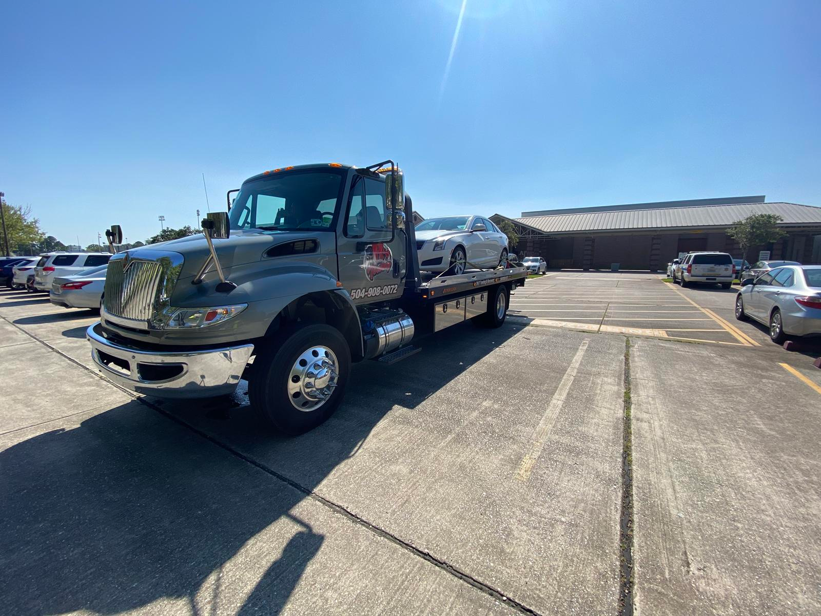 Local Light Heavy Duty Towing Tow Truck Wrecker Roadside Assistance Services Near Me in New Orleans Louisiana (LA) and surrounding areas including but not limited to the Westbank, Harvey, Gretna, Algiers, Marrero, Westwego, Belle Chasse, Chalmette, Luling, Destrehan, Kenner & Metairie.