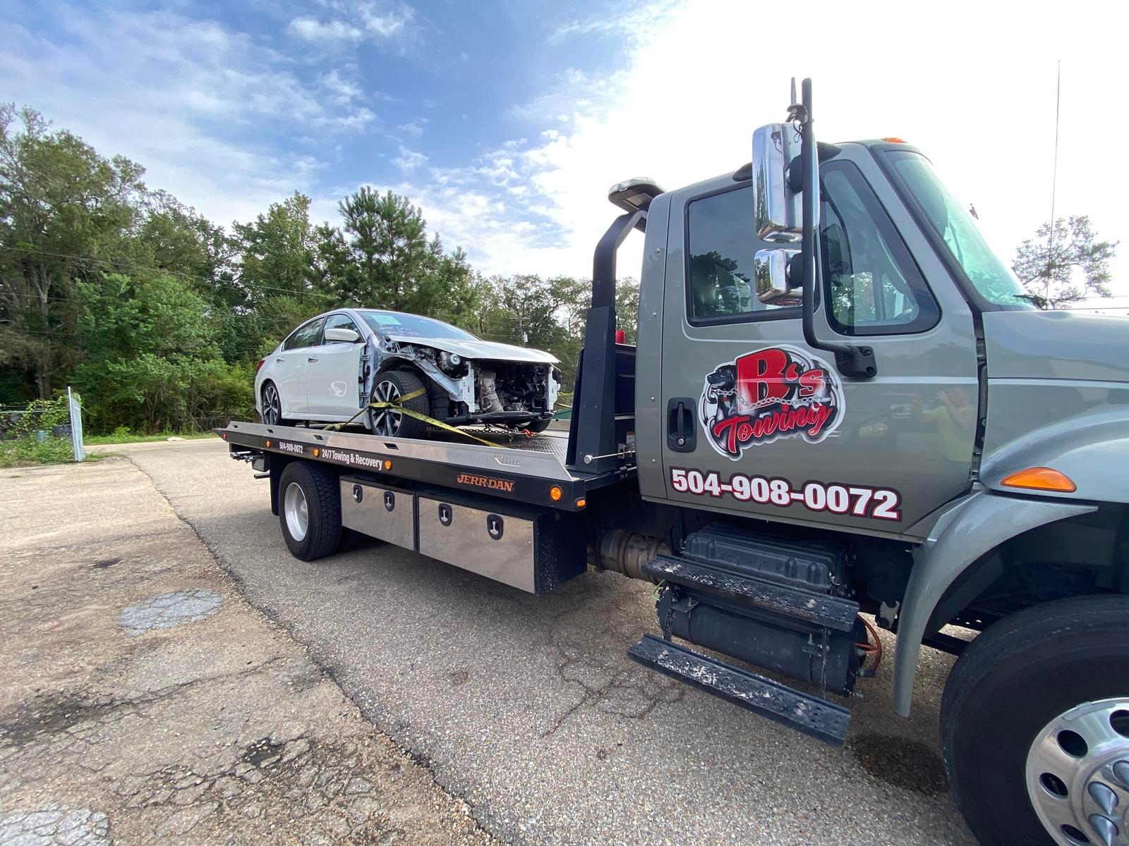 Local Light Heavy Duty Towing Tow Truck Wrecker Roadside Assistance Services Near Me in New Orleans Louisiana (LA) and surrounding areas including but not limited to the Westbank, Harvey, Gretna, Algiers, Marrero, Westwego, Belle Chasse, Chalmette, Luling, Destrehan, Kenner & Metairie.
