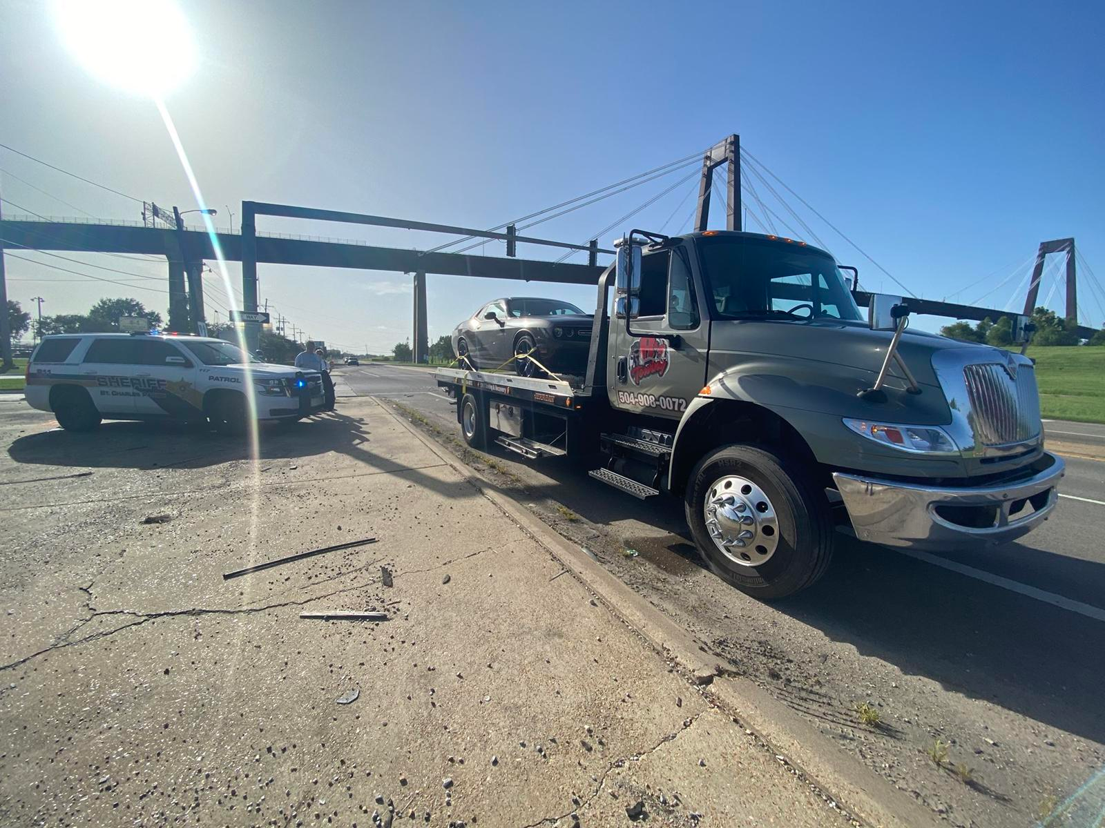 Local Light Heavy Duty Towing Tow Truck Wrecker Roadside Assistance Services Near Me in New Orleans Louisiana (LA) and surrounding areas including but not limited to the Westbank, Harvey, Gretna, Algiers, Marrero, Westwego, Belle Chasse, Chalmette, Luling, Destrehan, Kenner & Metairie.